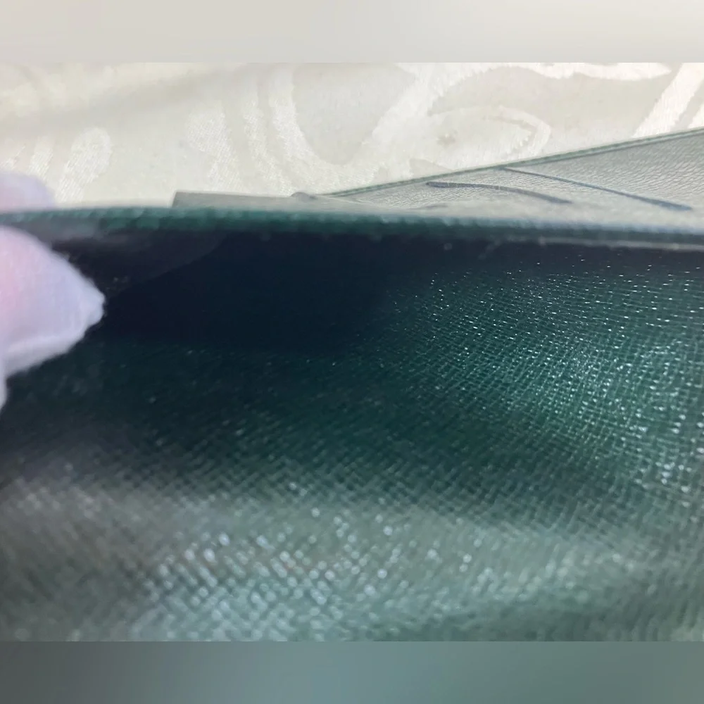 1043: Louis Vuitton Taiga Leather Long Bifold Wallet Green